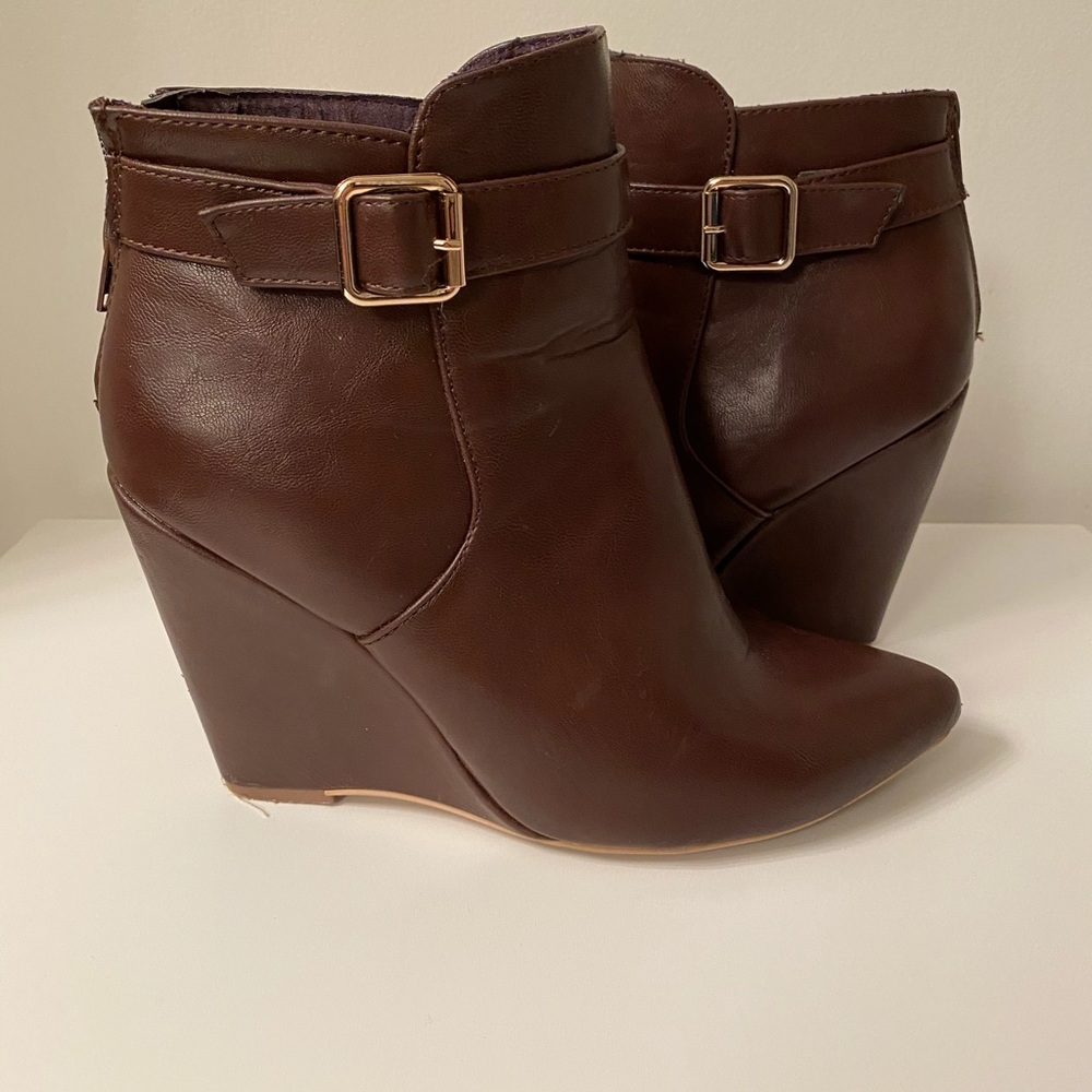 Wedge ankle booties with gold buckle